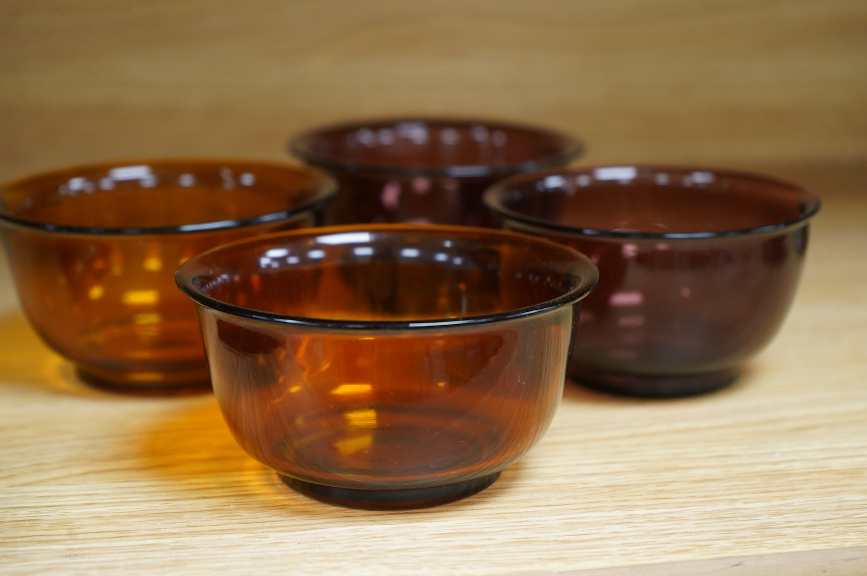 Two pairs of Chinese 'Peking' glass bowls, largest 11cm diameter